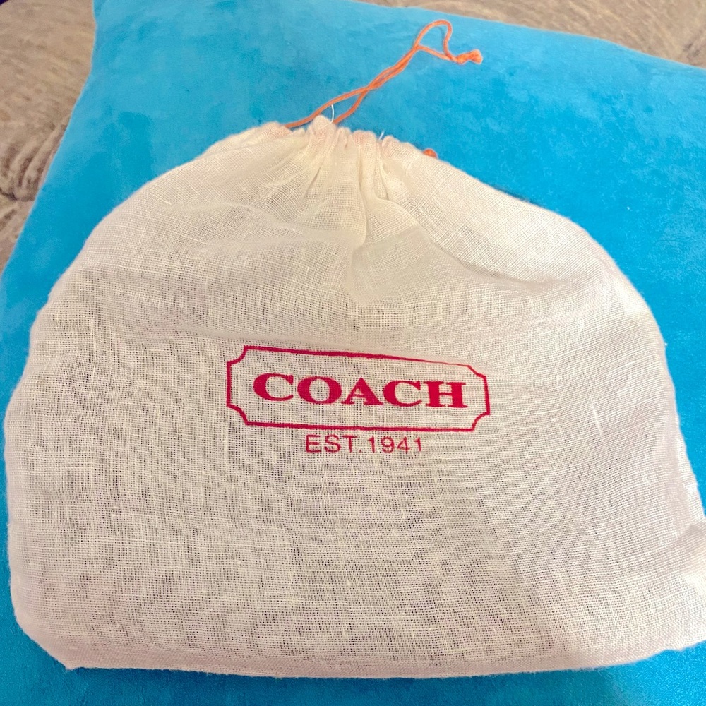 Authentic Signature C cloth Coach wristlet.